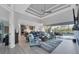 Bright living room with open floor plan and kitchen views at 14351 Howard Ave, Port Charlotte, FL 33953
