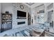 Living area featuring a stone fireplace and built-in shelving at 14351 Howard Ave, Port Charlotte, FL 33953