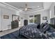 Main bedroom with king bed and access to private balcony at 14351 Howard Ave, Port Charlotte, FL 33953
