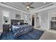 Main bedroom with king-size bed and walk-in closet at 14351 Howard Ave, Port Charlotte, FL 33953