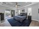 Main bedroom with king bed and sliding doors to the pool area at 14351 Howard Ave, Port Charlotte, FL 33953