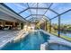 Spacious pool area with covered patio at 14351 Howard Ave, Port Charlotte, FL 33953