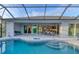 Large pool and patio with access to the home at 14351 Howard Ave, Port Charlotte, FL 33953