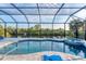 Relaxing pool with spa and tranquil water views at 14351 Howard Ave, Port Charlotte, FL 33953