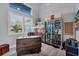 Bright and airy sewing room with ample storage and natural light at 14351 Howard Ave, Port Charlotte, FL 33953