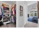 Organized walk-in closet with shelves and hanging rods at 14351 Howard Ave, Port Charlotte, FL 33953