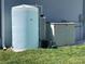 Exterior water system with large tank and water softener at 14351 Howard Ave, Port Charlotte, FL 33953