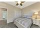 Cozy bedroom with queen bed and access to bathroom at 2148 La Palma Ave, Port Charlotte, FL 33953