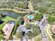 Community features a resort-style pool and lush landscaping at 2148 La Palma Ave, Port Charlotte, FL 33953