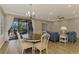 Bright dining room with a table, chairs, and view to the pool at 2148 La Palma Ave, Port Charlotte, FL 33953