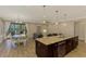 Modern kitchen with granite countertops and stainless steel appliances at 2148 La Palma Ave, Port Charlotte, FL 33953