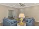 Living room with seating area and access to a home office space at 2148 La Palma Ave, Port Charlotte, FL 33953