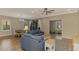 Spacious living room with a comfortable sofa and access to a dining area at 2148 La Palma Ave, Port Charlotte, FL 33953