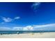Ocean view from the beach, showing people enjoying a sunny day at 2255 N Beach Rd # 9, Englewood, FL 34223