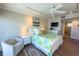 Spacious bedroom with king bed, TV, and plenty of closet space at 2255 N Beach Rd # 9, Englewood, FL 34223