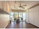 Bright bedroom with built-in cabinets and access to balcony at 2255 N Beach Rd # 9, Englewood, FL 34223