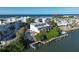 Aerial view showcasing a canal-front home, pool, and private dock at 2255 N Beach Rd # 9, Englewood, FL 34223