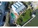 Aerial view of canal-front property with private pool and dock access at 2255 N Beach Rd # 9, Englewood, FL 34223