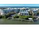 Drone view of canal-front home with private pool and dock at 2255 N Beach Rd # 9, Englewood, FL 34223