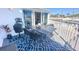 Private balcony with table and chairs, perfect for outdoor dining at 2255 N Beach Rd # 9, Englewood, FL 34223