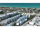 Aerial perspective of modern coastal homes, offering ocean views at 2255 N Beach Rd # 9, Englewood, FL 34223