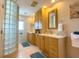 Large bathroom with double sinks and a walk-in shower at 2255 N Beach Rd # 9, Englewood, FL 34223