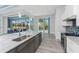 Modern kitchen with stainless steel appliances and large island at 231 Rotonda N Blvd, Rotonda West, FL 33947