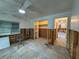 Renovation in progress: Bedroom with exposed framing and flooring at 2930 Waterside Dr, Englewood, FL 34224