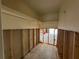 Unfinished closet, open to backyard, undergoing renovation at 2930 Waterside Dr, Englewood, FL 34224