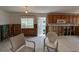 Kitchen in the midst of a remodel, with exposed framing and wiring at 2930 Waterside Dr, Englewood, FL 34224