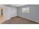 Simple bedroom with neutral walls and carpet at 3016 Montgomery Dr, Port Charlotte, FL 33981