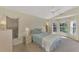 Spacious bedroom with a view and ceiling fan at 3300 Pennyroyal Rd, Port Charlotte, FL 33953