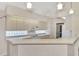 Well-equipped kitchen boasting ample counter space and white appliances at 3300 Pennyroyal Rd, Port Charlotte, FL 33953