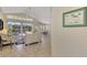 Spacious living room with sliding doors leading to the pool area at 3300 Pennyroyal Rd, Port Charlotte, FL 33953