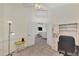 Home office with built-in desk and view of living room at 3300 Pennyroyal Rd, Port Charlotte, FL 33953