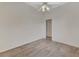 Spacious bedroom with ceiling fan and light grey tile floor at 3392 Pennyroyal Rd, Port Charlotte, FL 33953