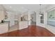 Kitchen with light wood cabinets and a breakfast bar at 3392 Pennyroyal Rd, Port Charlotte, FL 33953