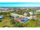 Aerial view showcasing home's location in community at 399 Sunset N Rd, Rotonda West, FL 33947