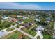 Aerial view showcasing a neighborhood of luxury homes at 90 Green Dolphin N Dr, Placida, FL 33946