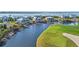 Waterfront homes and golf course with scenic waterway at 10030 Eagle Preserve Dr, Englewood, FL 34224
