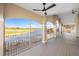 Extended screened balcony with golf course and water views at 10030 Eagle Preserve Dr, Englewood, FL 34224