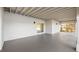 Covered back patio with sliding glass doors leading to the backyard at 10030 Eagle Preserve Dr, Englewood, FL 34224