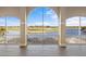 Relaxing screened balcony overlooking the golf course and lake at 10030 Eagle Preserve Dr, Englewood, FL 34224