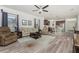 Spacious living room with hardwood floors and an open floor plan at 11249 Mc Dermott Ct, Englewood, FL 34223
