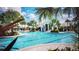 Community pool with lap lanes and a large sundeck at 11249 Mc Dermott Ct, Englewood, FL 34223