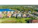 Aerial view of houses near lake at 11564 Renaissance Blvd, Venice, FL 34293