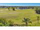 Picturesque aerial view of lush golf course and community, showcasing scenic greenery at 16 Golfview Ct, Rotonda West, FL 33947