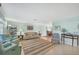 Bright and airy living room featuring a neutral color palette and comfortable seating at 16 Golfview Ct, Rotonda West, FL 33947