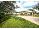 Covered picnic pavilion with tables and benches, perfect for outdoor gatherings at 16 Golfview Ct, Rotonda West, FL 33947