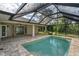 Lovely pool area with a covered patio at 19 Long Meadow Ln, Rotonda West, FL 33947